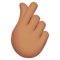 Hand with Index Finger and Thumb Crossed- Medium Skin Tone emoji on Apple
